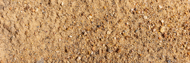 Panoramic image. Fine gravel for the construction. Fine gravel background