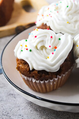 cupcake with icing and sprinkles