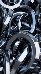 A collection of shiny metal rings overlaps intricately, casting reflections and shadows in a captivating manner