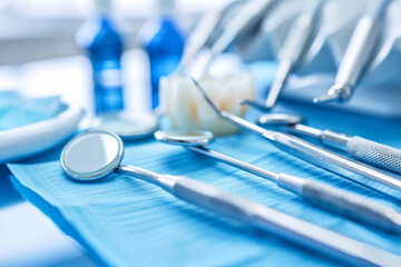Dental tools on dentist office background