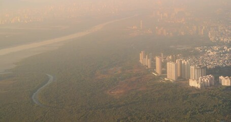 Ghansoli, Navi Mumbai, Maharashtra, India. Mumbai Metropolitan Region. Aerial View From Airplane Window On View of the Mumbai suburb district. Evening morning sunset sunrise light. residential