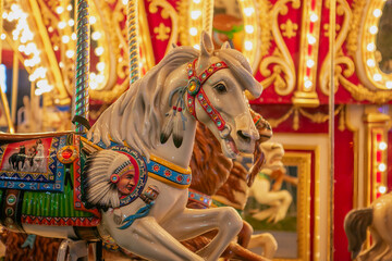 closeup of a carousel horse at night © Deana