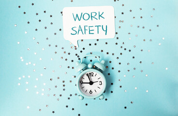 A clock with the words Work Safety written above it