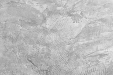 concrete wall with a raw, unfinished look showcases the rough texture of the material. The minimalist design highlights the industrial feel, with visible seams and natural imperfections 