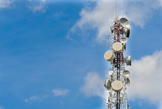  antenna  on communication tower on blue sky background