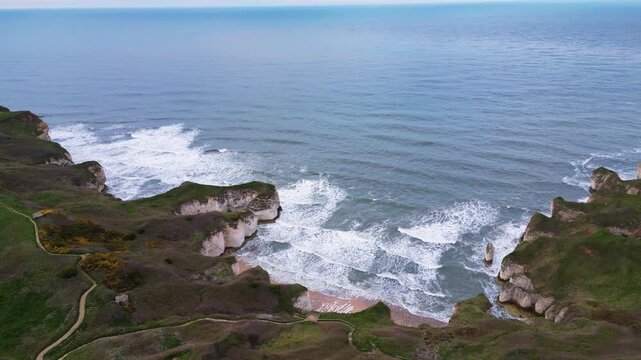 Beach in the middle of the cliffs in Flamborough, UK