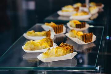 Apple tart or cake on sale in a bar or a coffee shop.