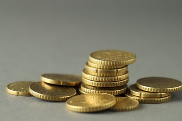 Many euro coins on grey background, closeup