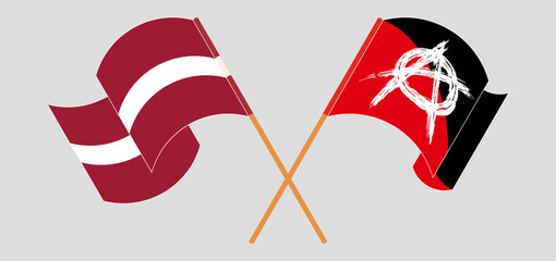 Crossed and waving flags of Latvia and Anarchy