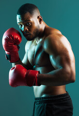 Black man, boxing and sport of portrait on studio background, power workout and fist impact of mma...