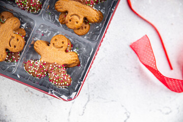 gingerbread man sweet christmas cookies gingerbread baked goods Christmas background New Year's holiday fresh meal food snack on the table copy space food background rustic top view