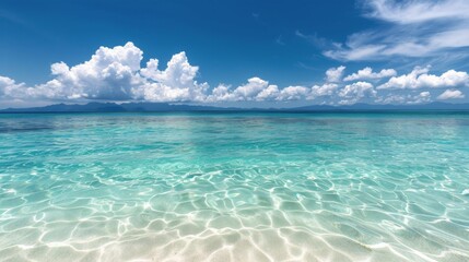Tranquil Ocean View With White Sand Beach and Blue Sky in the Afternoon