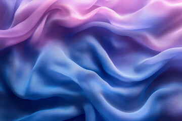 Obraz premium A close-up of smooth blue and purple fabric swirling together, capturing the texture and softness of the material,
