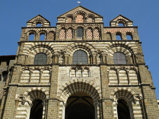 Fototapeta premium Romanesque facade of the Cathedral of Puy-en-Velay. 12th century. Auvergne. France