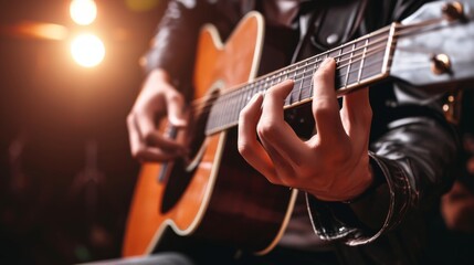 Naklejka premium A musician passionately playing an acoustic guitar