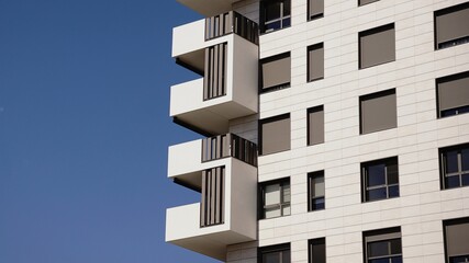modern facade of residential building against the sky