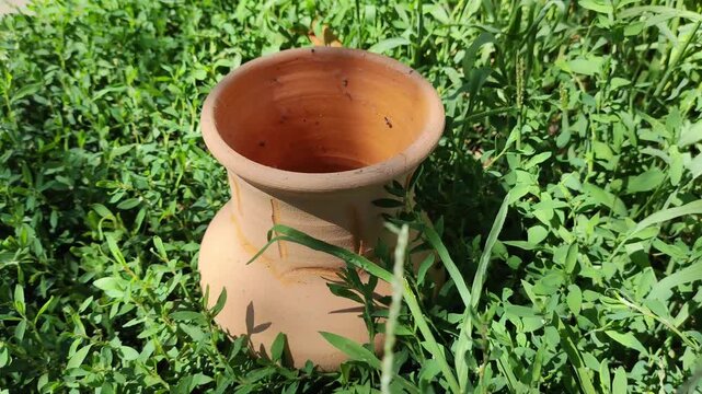 orange clay jug. antique jug. Clay pots outdoor decor. A Group of Large Old Clay Jars With Cracks . treasure of medieval silver coins