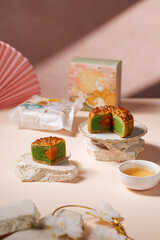A mooncake  is a Chinese bakery product traditionally eaten during the Mid-Autumn Festival.