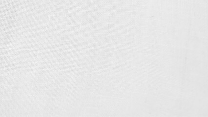 Close-up of fabric woven from burlap. White jute texture