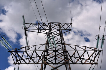 High voltage power line on blue sky background in Sunny day. wires, problems with electricity,...