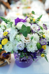 Gift bouquet of flowers in a basket, fresh flowers.