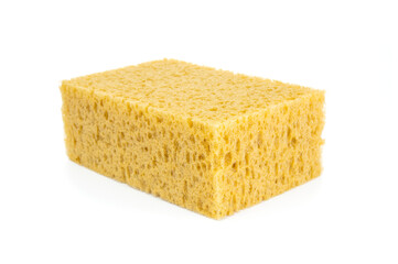 Yellow sponge close up isolated on a white background