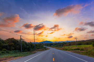 Concrete road and beautiful mountain scenery,Concrete road and beautiful mountain scenery,asphalt road in thailand 