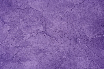 Abstract purple cement wall texture background with cracks