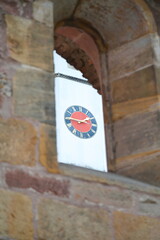 view on a clock through a window