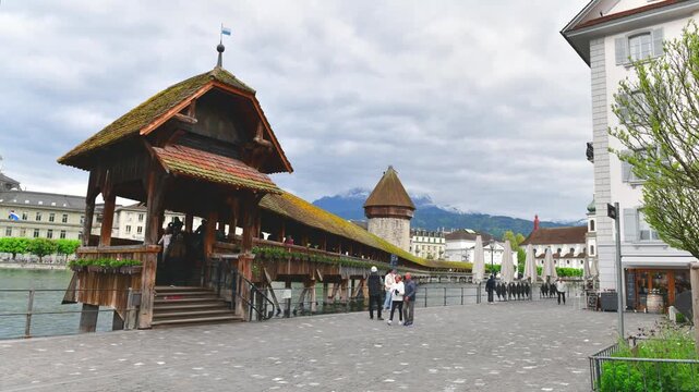 Timelapse historic city of Lucerne with famous Chapel Bridge and Water Tower , Switzerland
