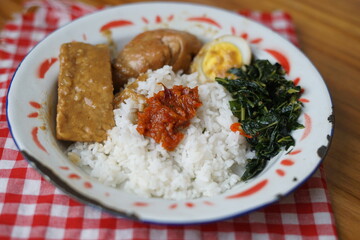 rice with egg, chicken and braised tempeh