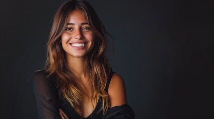 Fototapeta premium Young Latina woman in portrait with crossed arms and a cheerful smile. Beautiful woman looking at camera with her arms crossed. generative ai