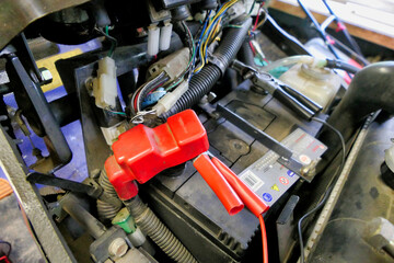 Charging a tractor battery - red and black terminals connected
