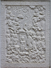 A stone carving in a Buddhist temple illustrating the birth of Buddha.