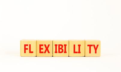 Flexibility symbol. Concept word Flexibility on beautiful wooden blocks. Beautiful white...