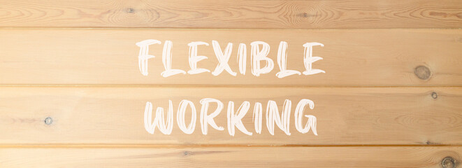 Flexible working symbol. Concept words Flexible working on beautiful wooden wall. Beautiful wooden wall background. Business flexible working concept. Copy space.