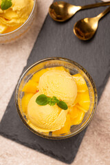 Natural mango ice cream in glass cremans