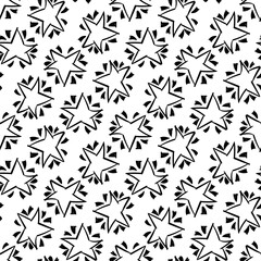 A seamless pattern of hand-drawn stars. Abstract repeating background