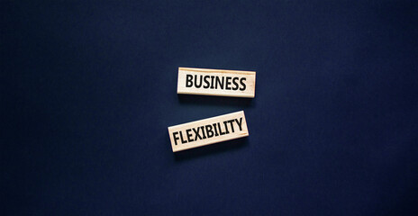 Business flexibility symbol. Concept words Business flexibility on beautiful wooden block. Beautiful black paper background. Business flexibility concept. Copy space.