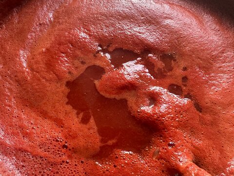 preparing tomato juice, boiling red tomato juice