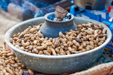Roasted peanuts prepared in the traditional way at the Pushkar fair in Rajasthan, India.