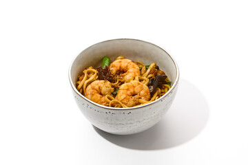 Delicious Wok Noodles with Shrimp and Wood Ear Mushrooms in a White Bowl on White Background