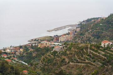 Fototapeta premium Coastal Town and Harbor Views From a Hilltop in Italy