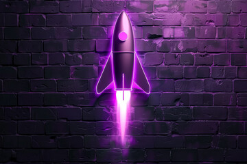 A neon sign of a rocket is lit up against a brick wall. The sign is pink and stands out against the dark background. The bright colors and the glowing rocket give the impression of excitement