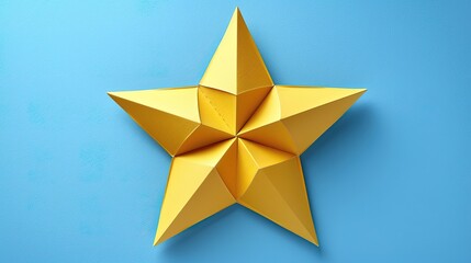 A yellow star made out of paper is on a blue background