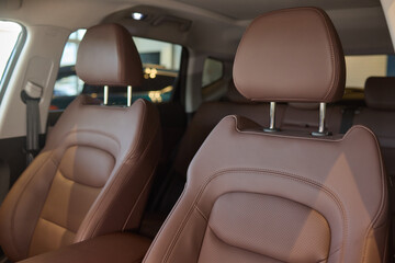 Car back seat with headrest and arm rest, a comfortable automotive fixture