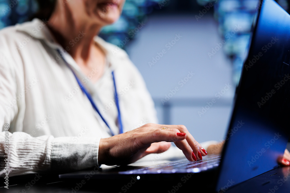 Poster precise serviceman using laptop, ensuring valuable data remains shielded from security menaces, safe