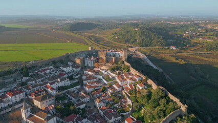 Historic castle standing height countryside sunny day. Scenic landscape field