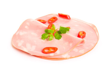 Slices of tasty boiled sausage with chilli on white background