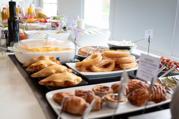 Buffet display featuring a variety of breakfast items
